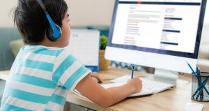 Young boy working on a computer